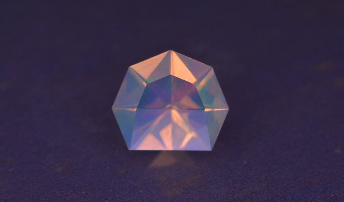 0.95 Ct Ethiopian Opal Half Moon