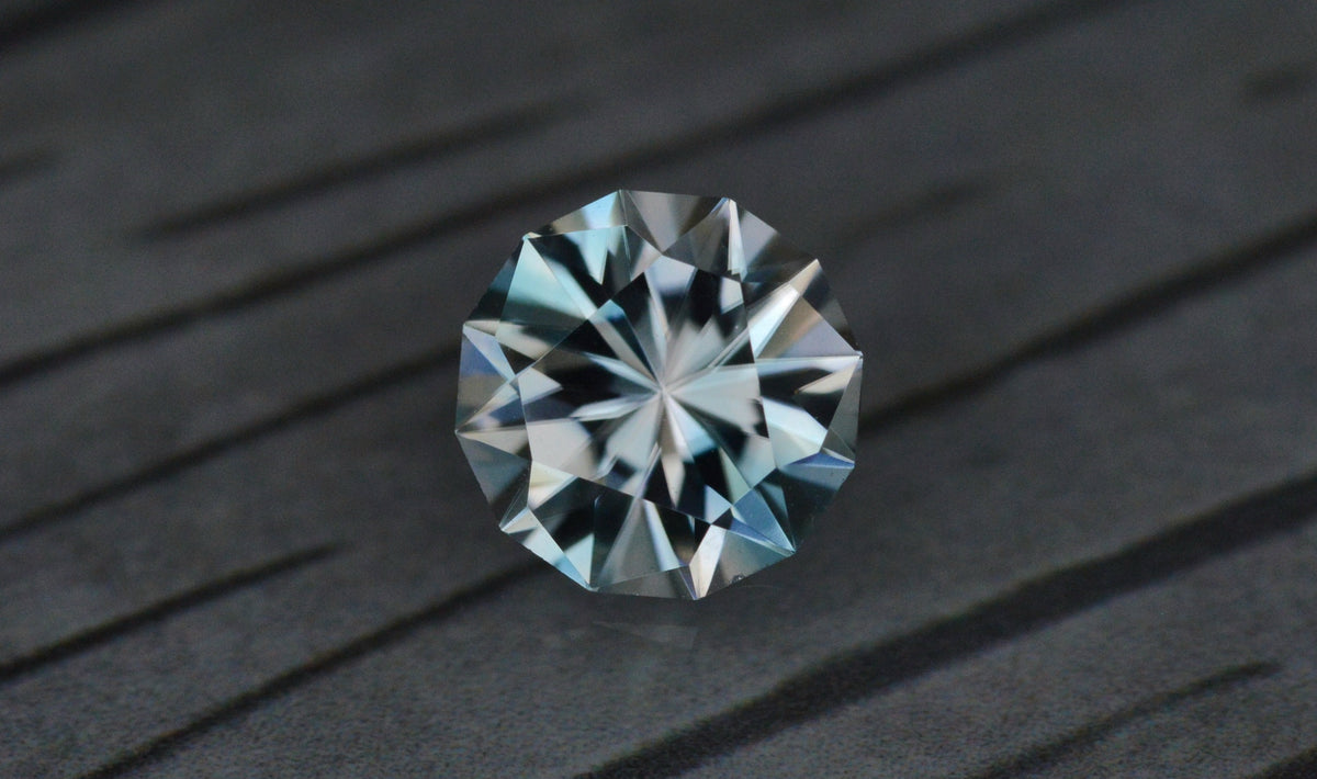 1.09 Ct Colorless/Blue Zircon Round